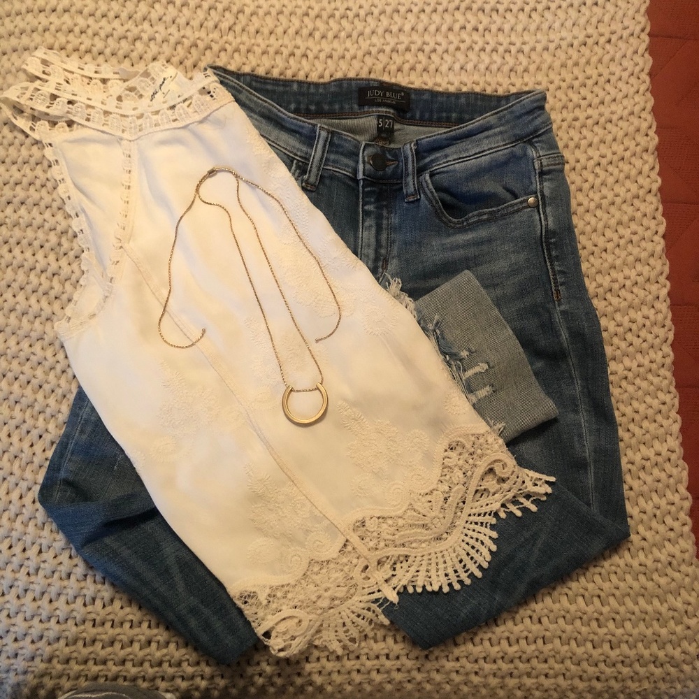 Women shirts and pants and necklace